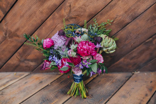 Deposit-Photos-Bouquet-on-Wood-Fence-Background