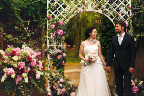 wonderful stylish rich happy bride and groom at a wedding ceremo