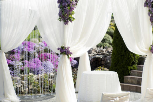 Festive wedding decoration of white fabric closeup