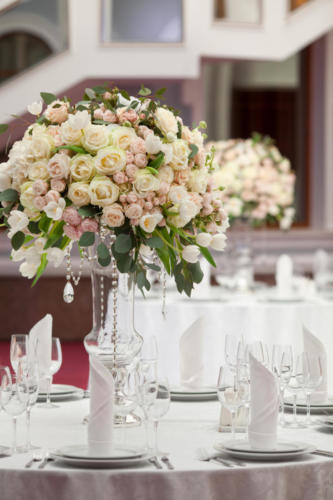 Beautiful flowers on table in wedding day. Luxury holiday background.