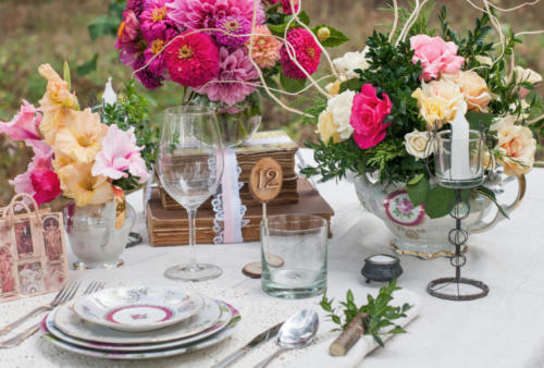 Bouquet of flowers and a table sat on the white tablecloths